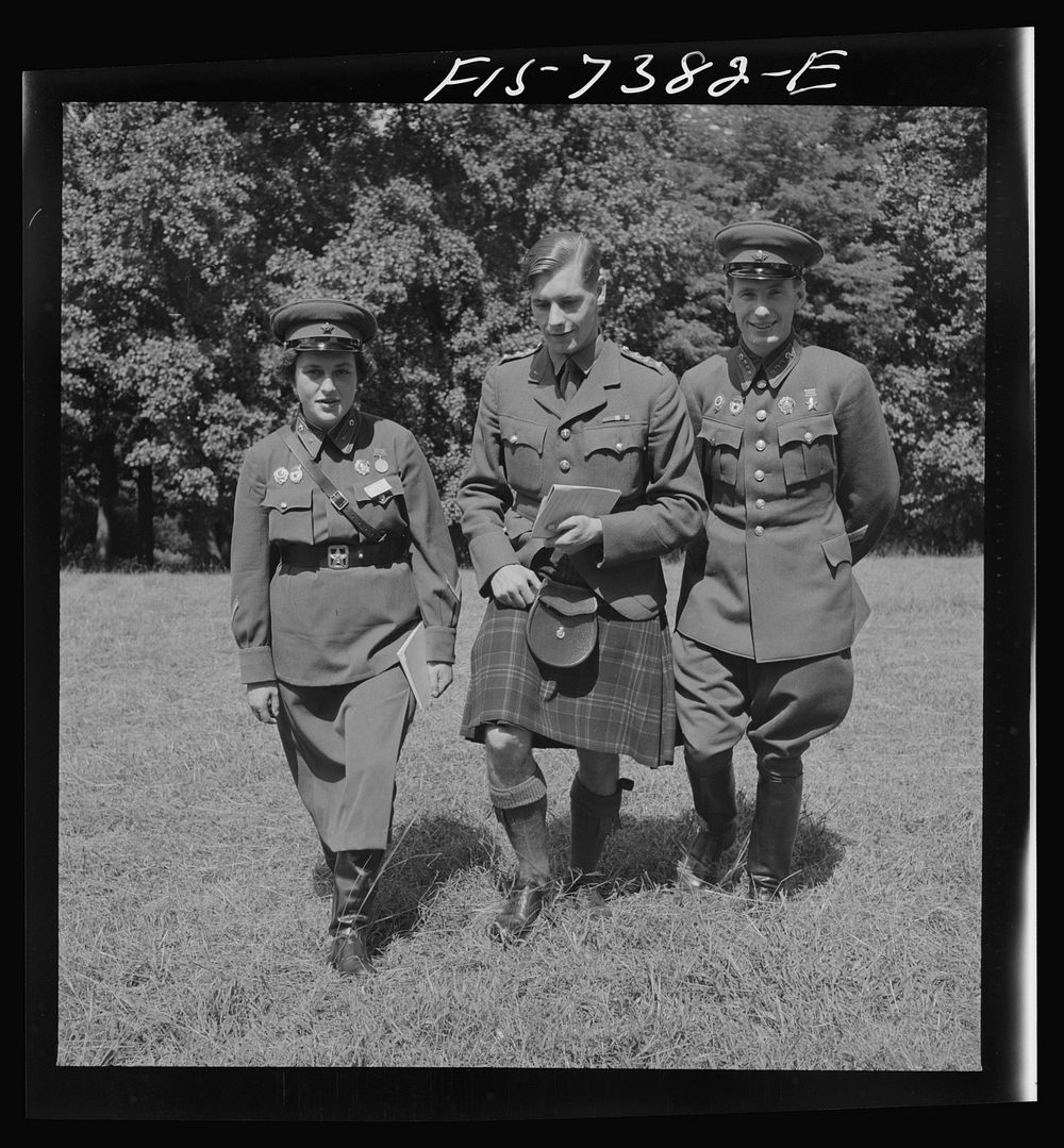 Washington, D.C. International youth assembly. Two of the Russian delegates with a Scottish aviator. Sourced from the…