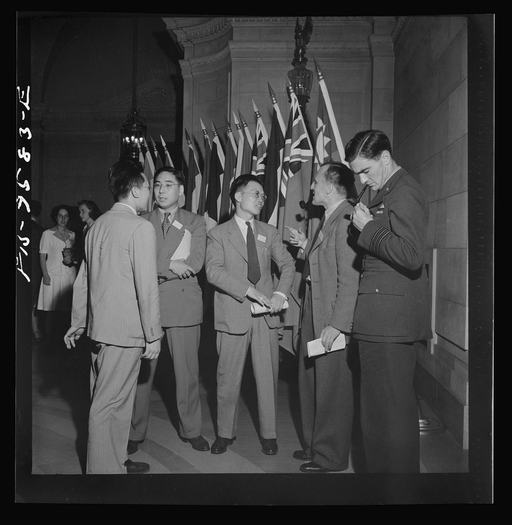 Washington, D.C. International youth assembly. British and Chinese delegates in the lobby. Sourced from the Library of…
