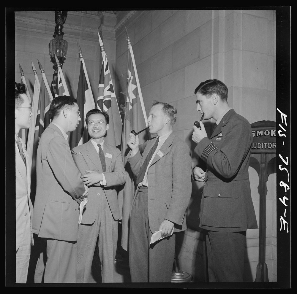 Washington, D.C. International youth assembly. British and Chinese delegates in the lobby. Sourced from the Library of…