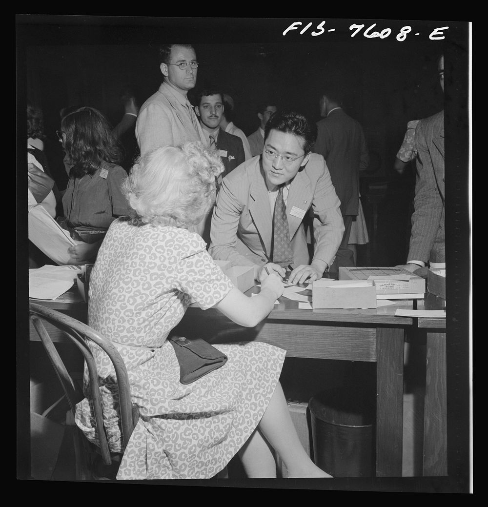 Washington, D.C. International youth assembly. A Chinese student from Dartmouth registering. Sourced from the Library of…