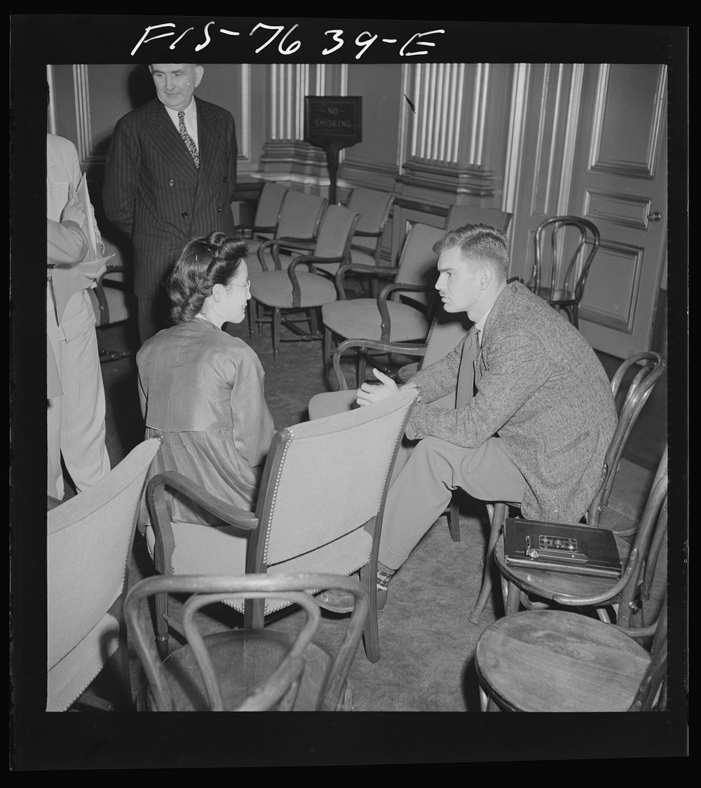 Washington, D.C. International youth assembly. Informal discussion between a Korean delegate, left, and a Canadian delegate.…