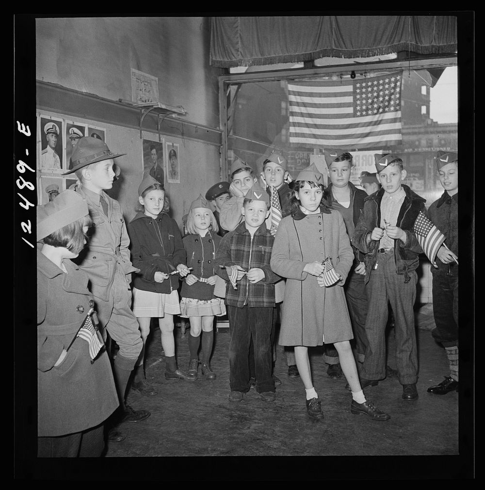 [Untitled photo, possibly related to: Chicago (north), Illinois. Boy Scouts who was one of the first to arrive for the flag…