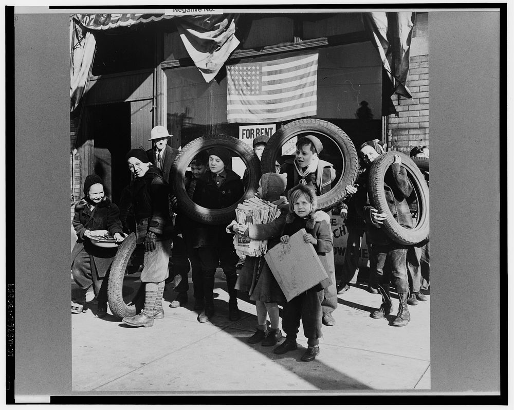 Chicago (north), Illinois. Children bringing scrap to the block Office of Civilian Defense headquarters. Sourced from the…
