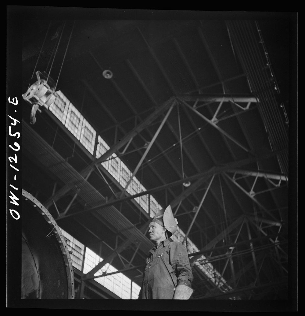 Chicago, Illinois. A welder at the Chicago and Northwestern Railroad shops. Sourced from the Library of Congress.