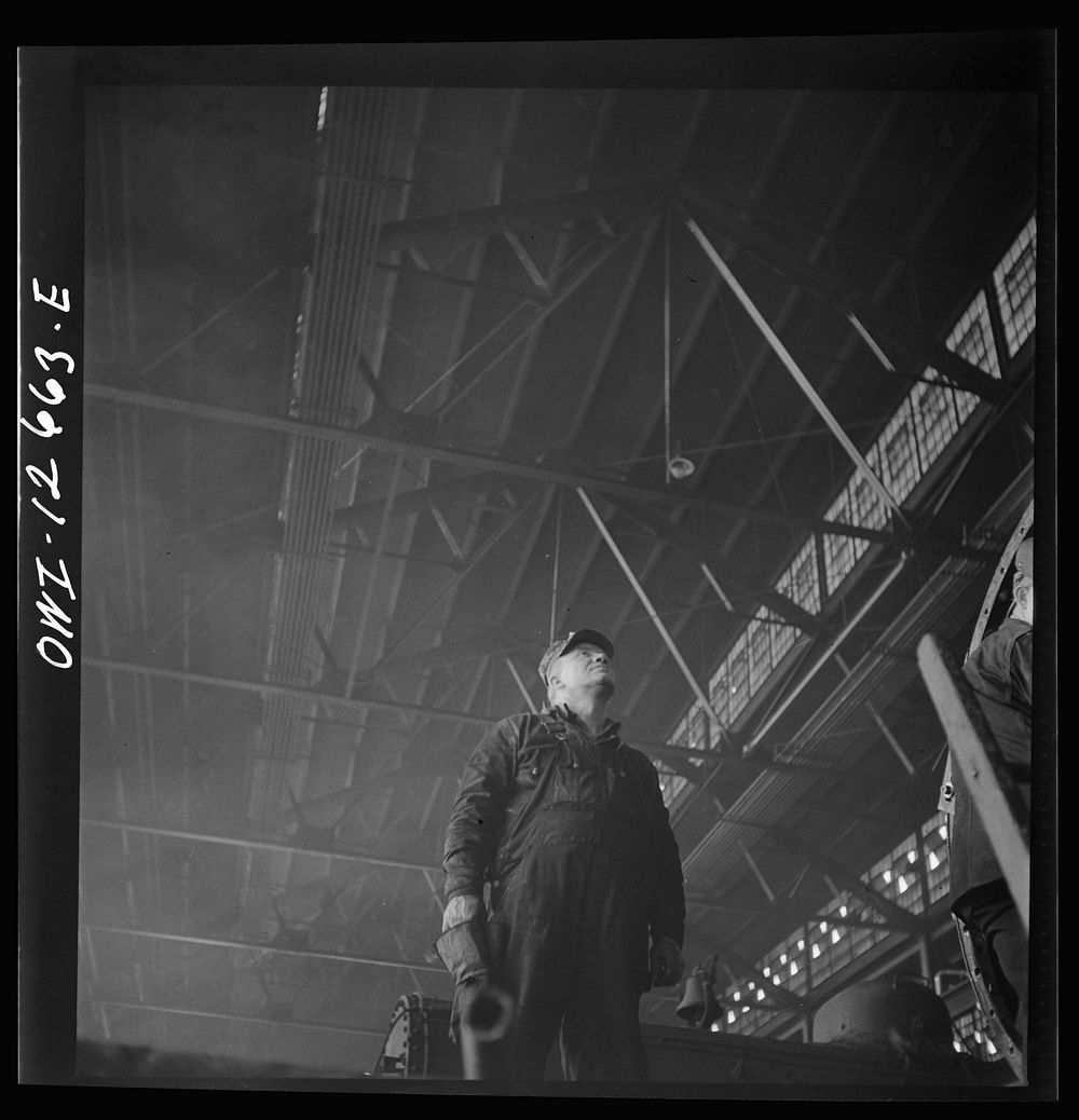 Chicago, Illinois. A welder's helper in the Chicago and Northwestern Railroad repair shop. Sourced from the Library of…