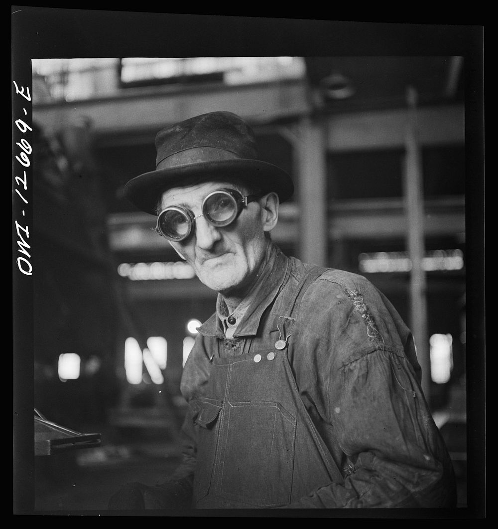 Chicago, Illinois. Worker employed at the Chicago and Northwestern Railroad repair shops. Sourced from the Library of…