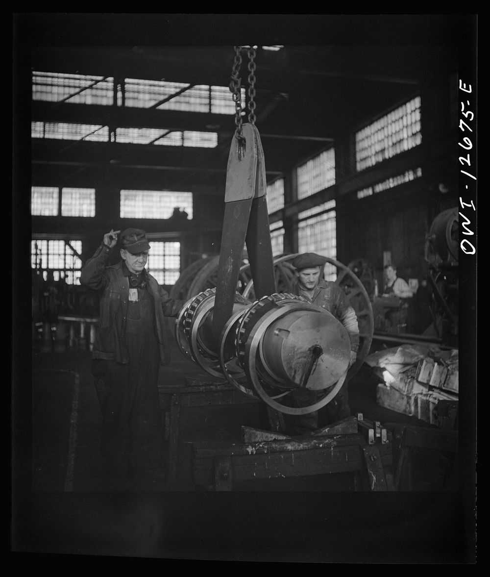 [Untitled photo, possibly related to: Chicago, Illinois. Refacing a wheel in the Chicago and Northwestern Railroad wheel…