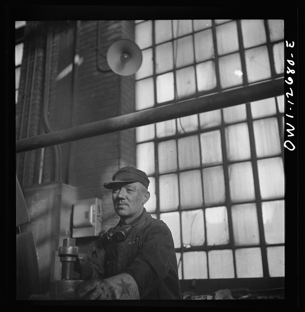 Chicago, Illinois. Operator of a refacing machine at the wheel shop in the Chicago and Northwestern Railroad repair shops.…