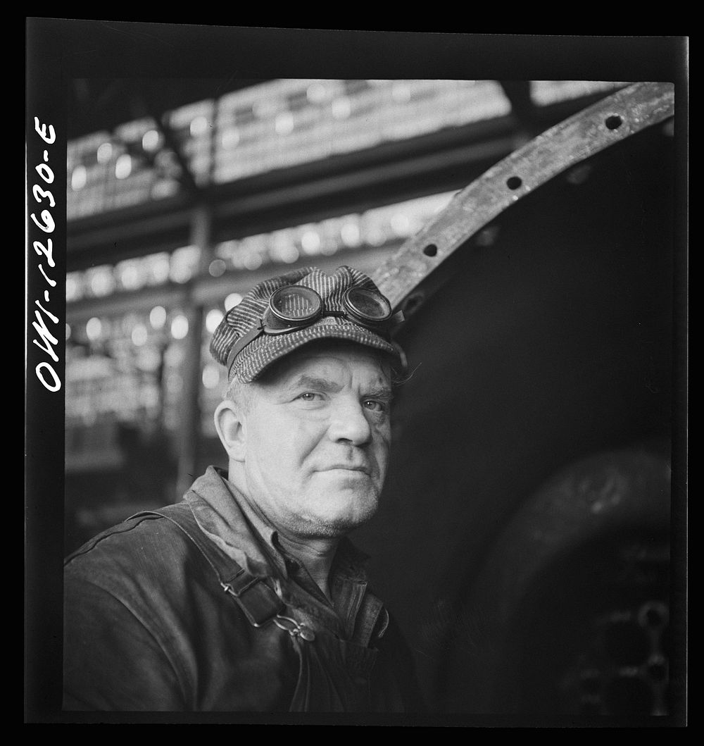 Chicago, Illinois. A welder's helper at a Chicago and Northwestern Railroad repair shop. Sourced from the Library of…