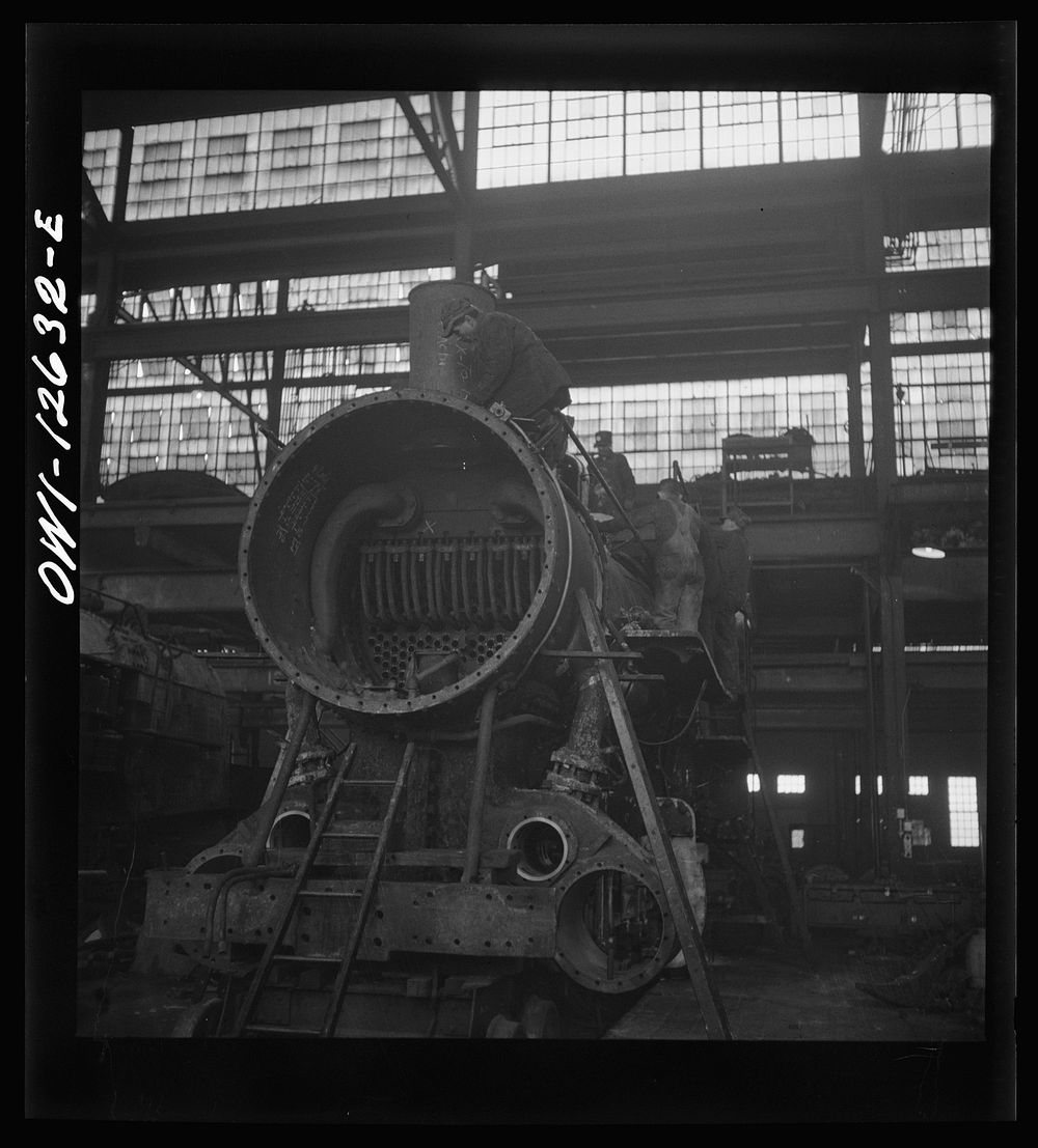 [Untitled photo, possibly related to: Chicago, Illinois. In the Chicago and Northwestern locomotive repair shop]. Sourced…