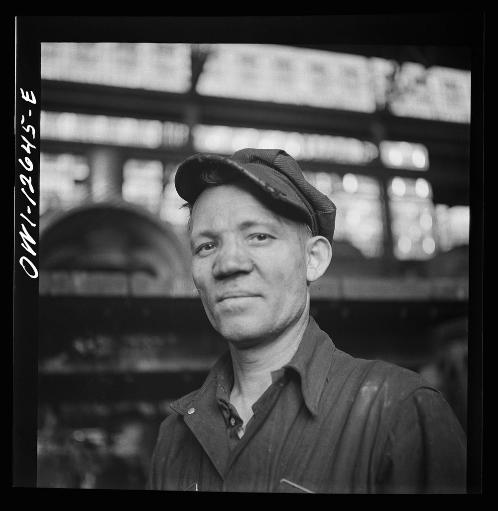 Chicago, Illinois. A welder at the Chicago and Northwestern Railroad repair shops. Sourced from the Library of Congress.