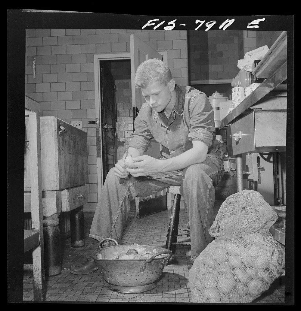 Fort Belvoir, Virginia. Sergeant George Camblair on kitchen police duty. Sourced from the Library of Congress.