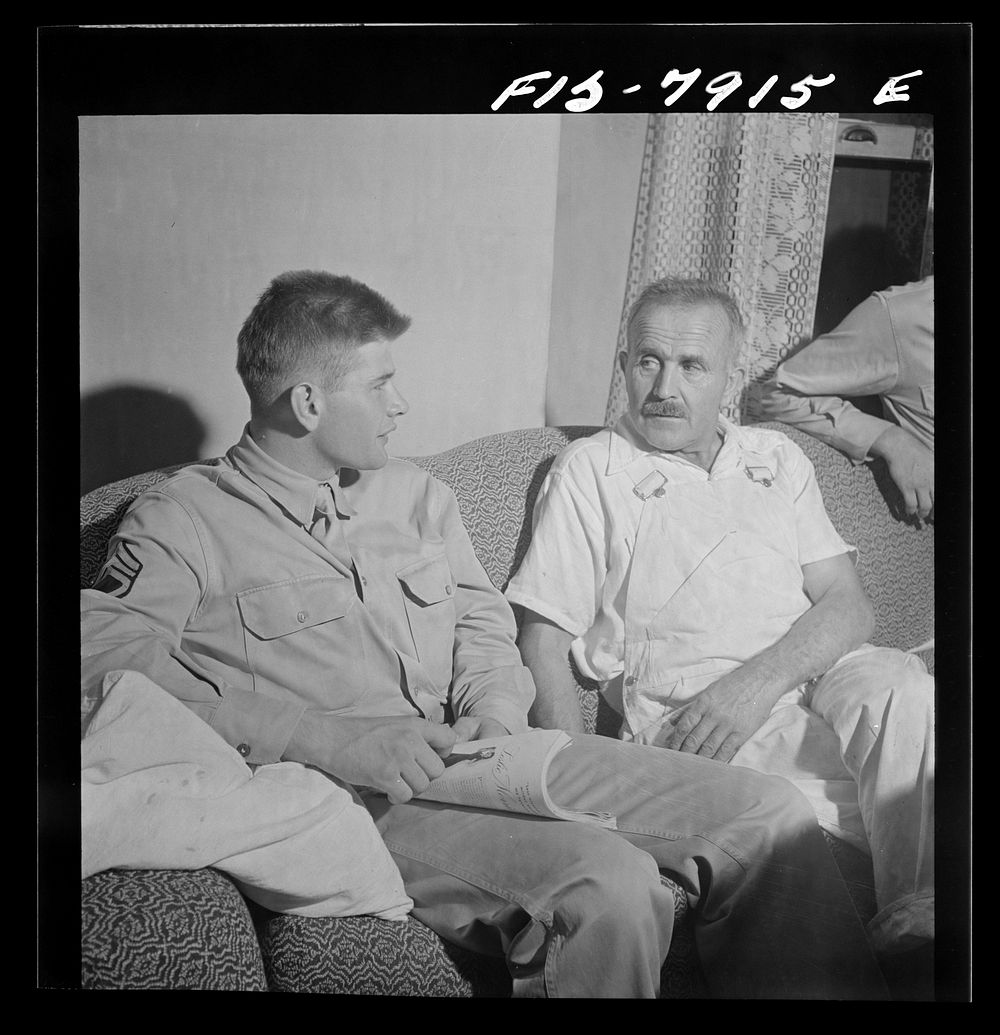 Washington, D.C. Sergeant George Camblair discussing the war with his father while on a visit home. Sourced from the Library…