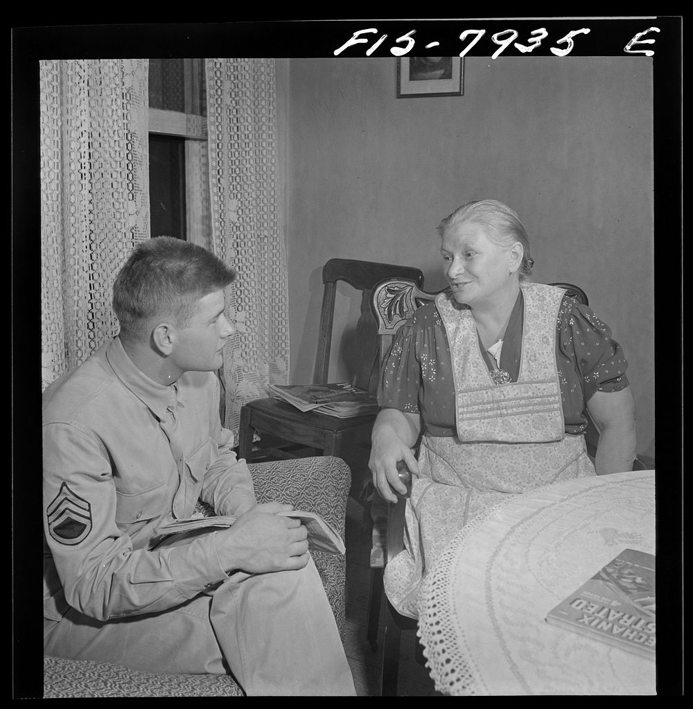 Washington, D.C. Sergeant George Camblair discussing problems with his mother while at home on a visit. Sourced from the…