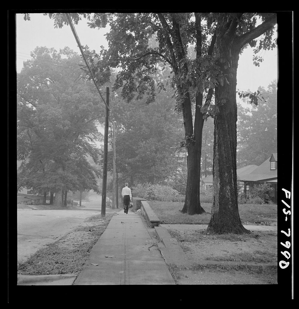 [Untitled photo, possibly related to: Washington, D.C. George Camblair leaving home early in the morning to go to the…