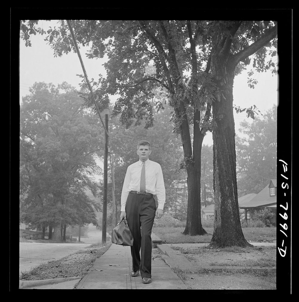 [Untitled photo, possibly related to: Washington, D.C. George Camblair leaving home early in the morning to go to the…