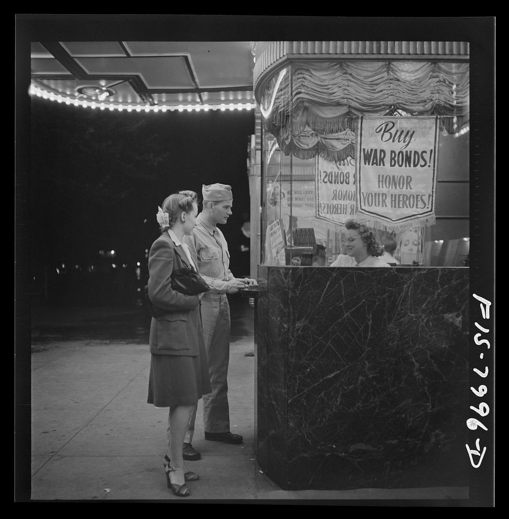 [Untitled photo, possibly related to: Washington, D.C. Sergeant George Camblair taking his girlfriend to the movies while he…