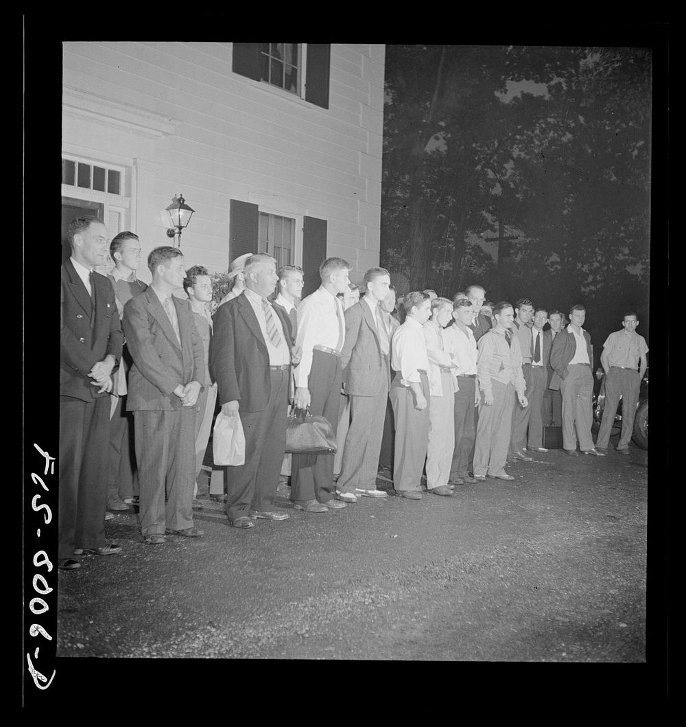 Washington, D.C. George Camblair lining up at the Selective Board early in the morning with other young men who are leaving…