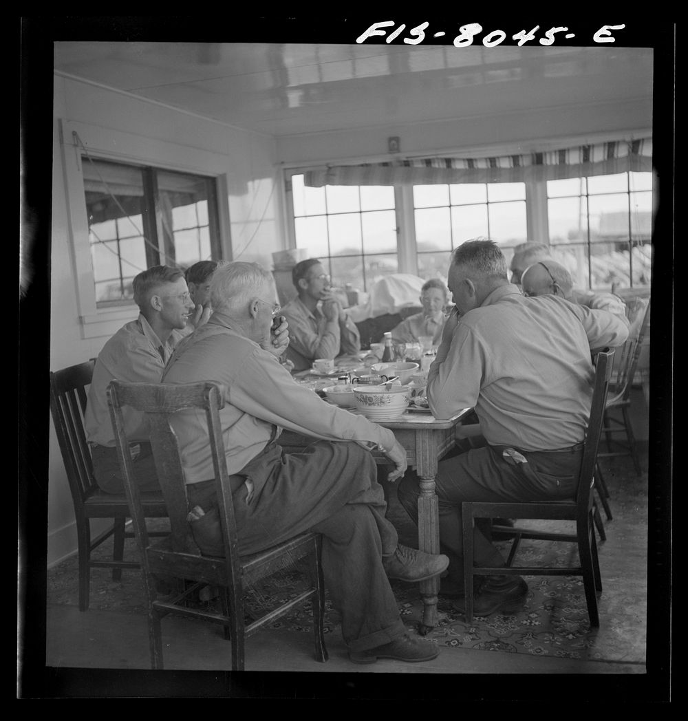 [Untitled photo, possibly related to: Big Hole Valley, Beaverhead County, Montana. Ranchers and cattle buyers eating dinner…