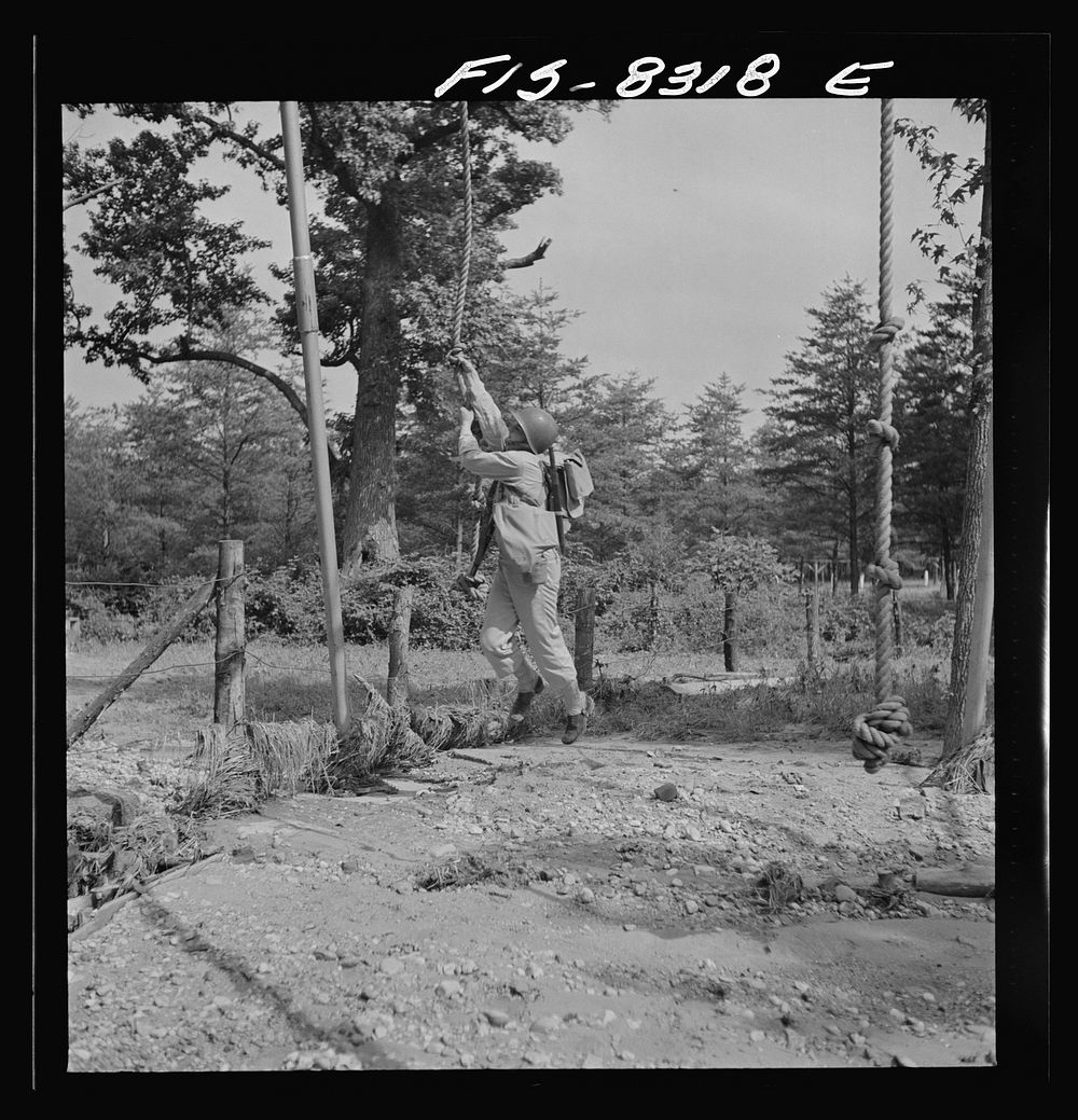[Untitled photo, possibly related to: Fort Belvoir, Virginia. Sergeant George Camblair getting rigorous physical training on…