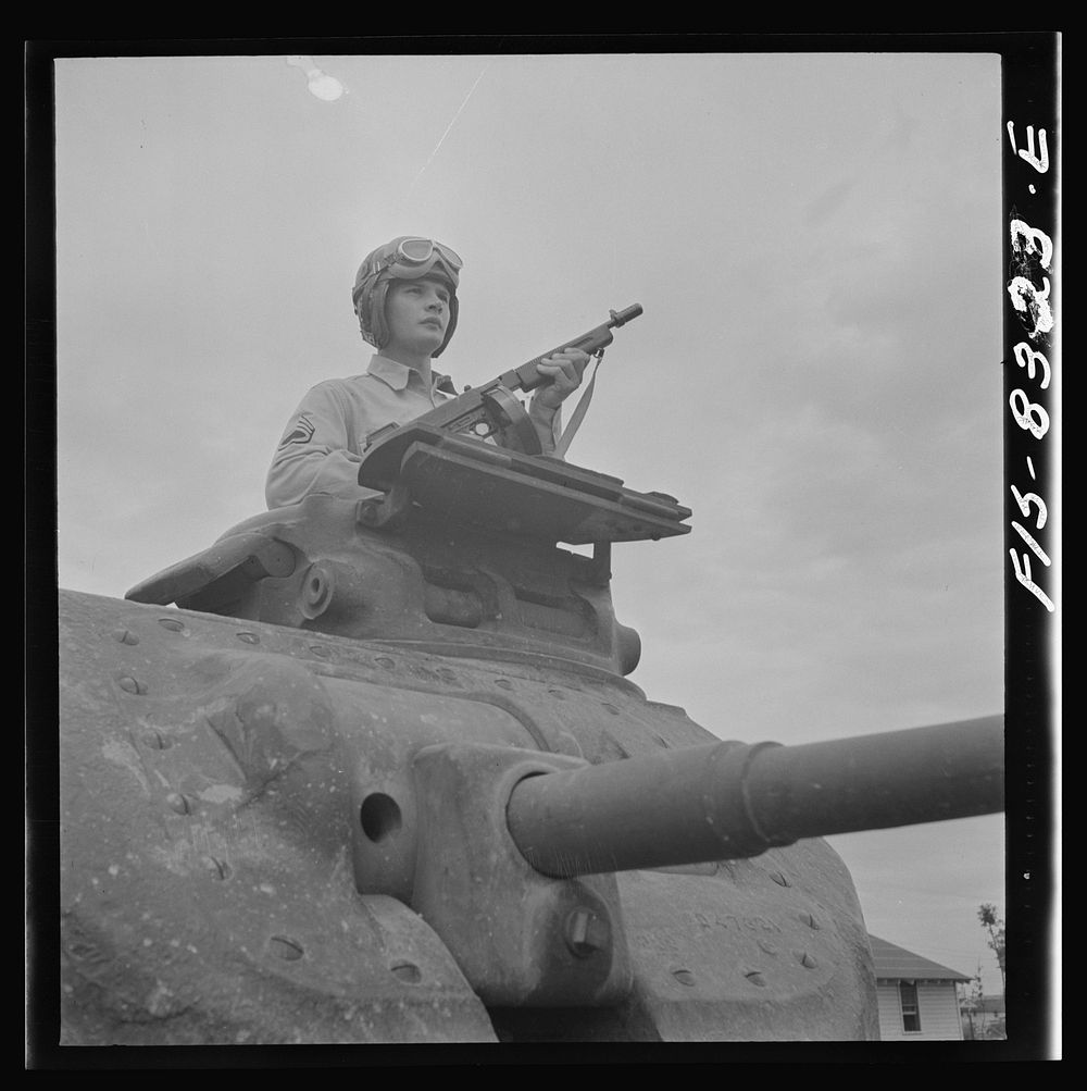 Fort Belvoir, Virginia. Sergeant George Camblair learning the operation of a tank. Sourced from the Library of Congress.