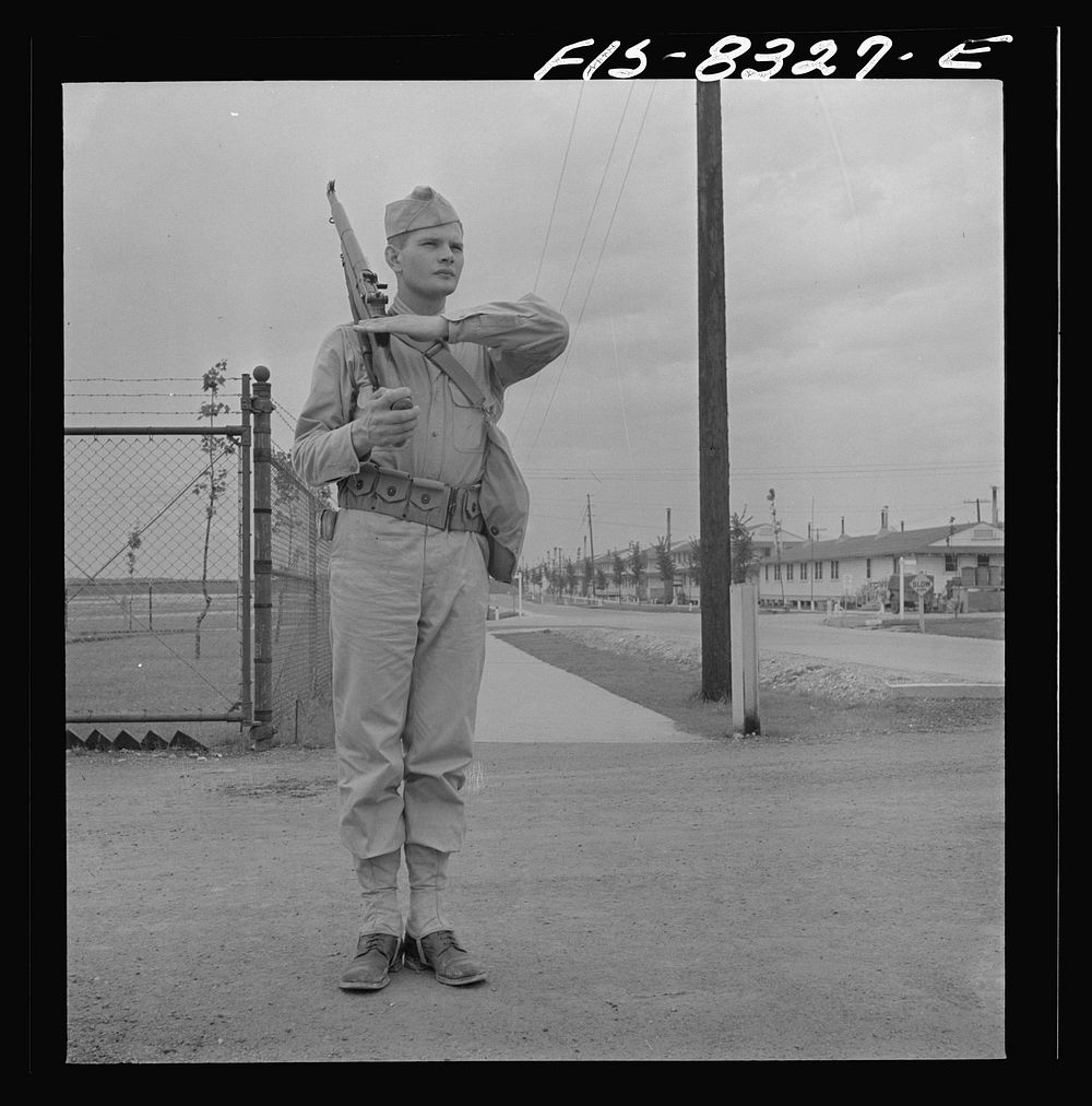 Fort Belvoir, Virginia. Sergeant George Camblair on sentry duty at camp. Sourced from the Library of Congress.