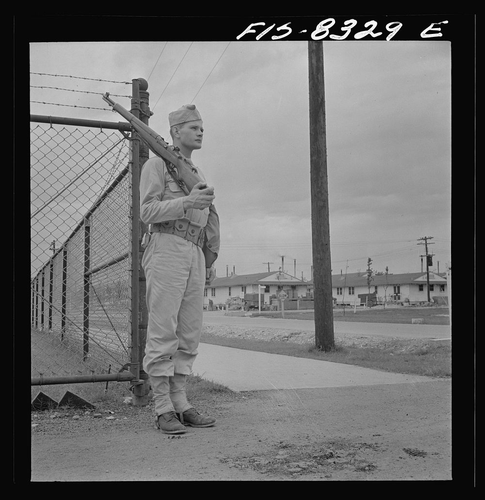 [Untitled photo, possibly related to: Fort Belvoir, Virginia. Sergeant George Camblair on sentry duty at camp]. Sourced from…