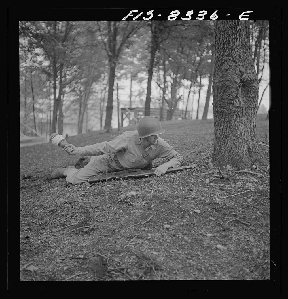 [Untitled photo, possibly related to: Fort Belvoir, Virginia. Sergeant George Camblair learning how to use a "Molotov…