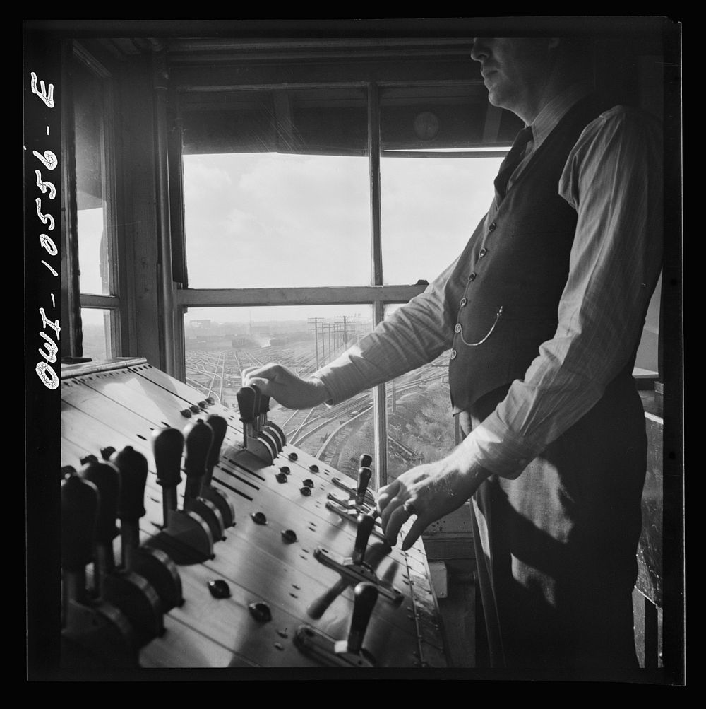 [Untitled photo, possibly related to: Chicago, Illinois. A retarder operator at the south hump at an Illinois Central…