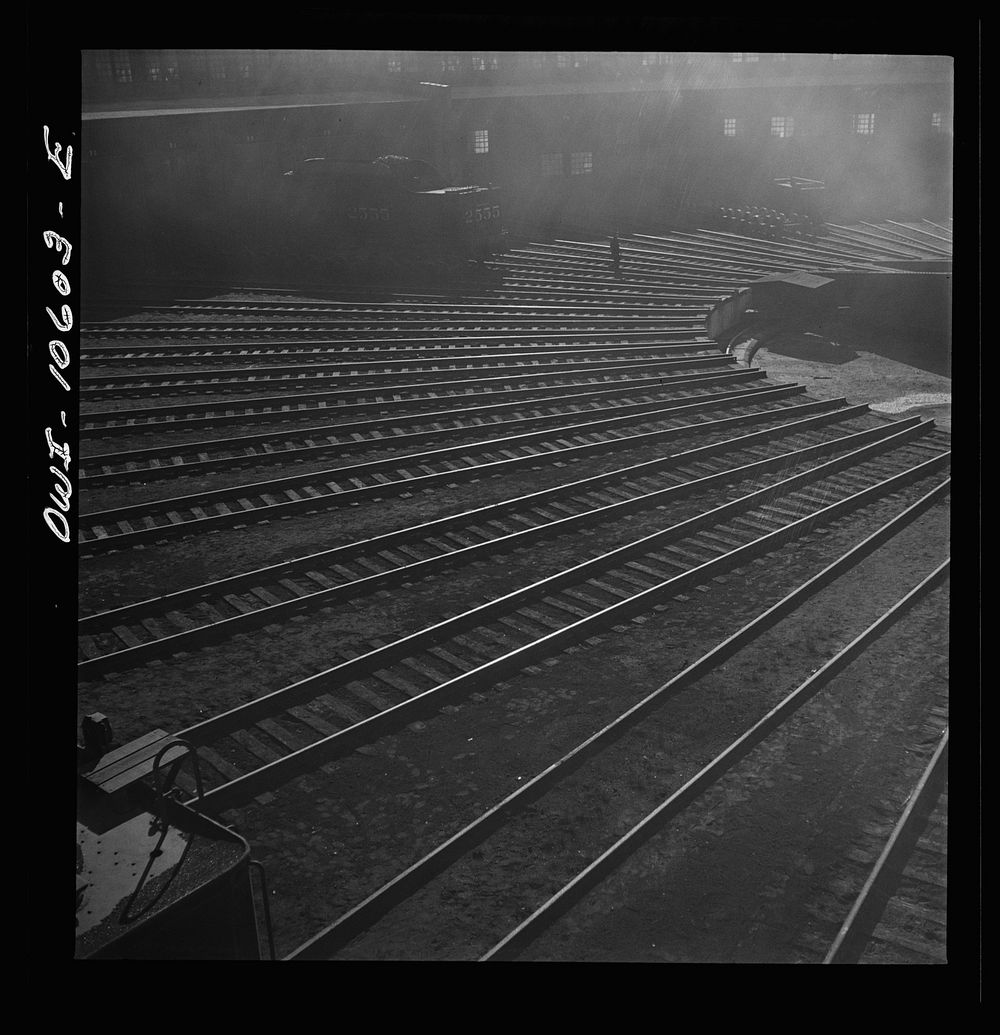 [Untitled photo, possibly related to: Chicago. Illinois. Track crews repairing tracks in the roundhouse at an Illinois…