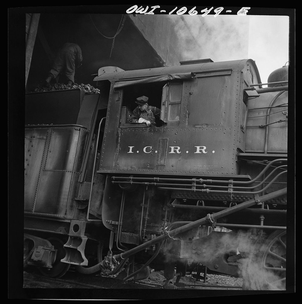 Chicago, Illinois. Engine taking on coal at an Illinois Central Railroad yard. Sourced from the Library of Congress.