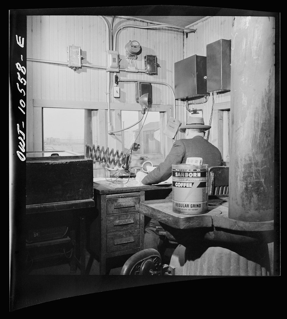 Chicago, Illinois. In a yardmaster's office at an Illinois Central Railroad yard. Sourced from the Library of Congress.