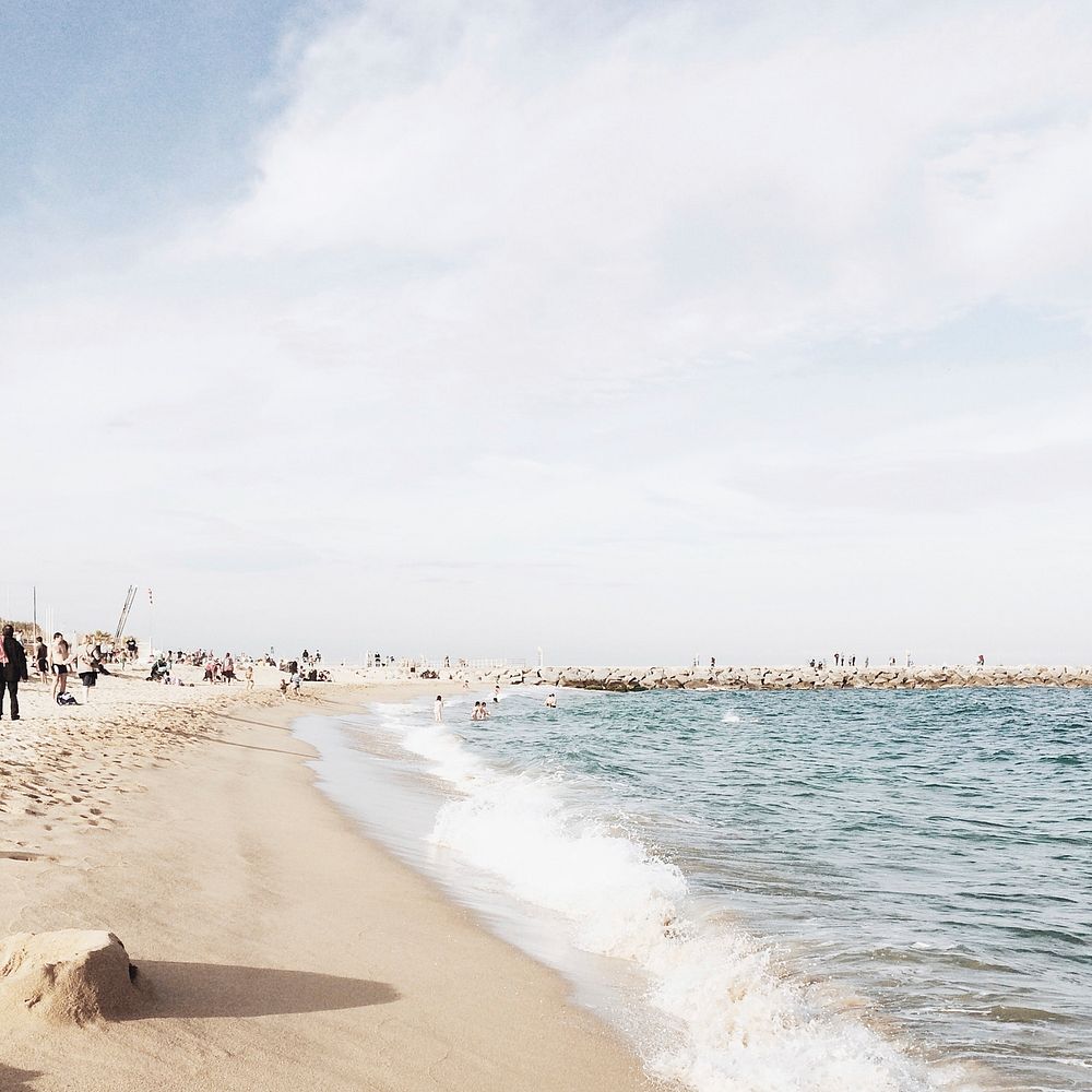 Crowded and sandy beach under clear sky, free public domain CC0 photo/image.