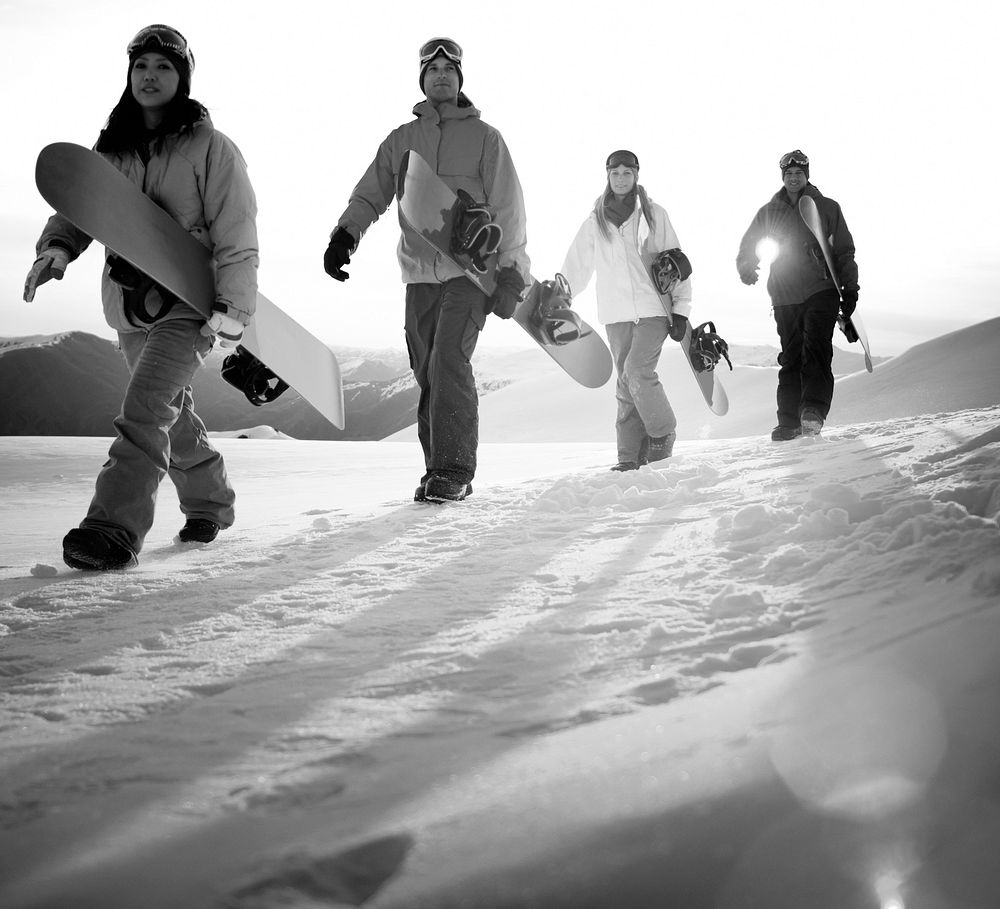 People on their way to snow boarding.