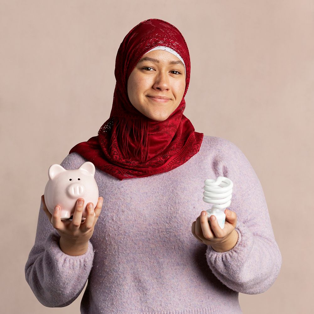 Muslim woman saving the energy mockup 