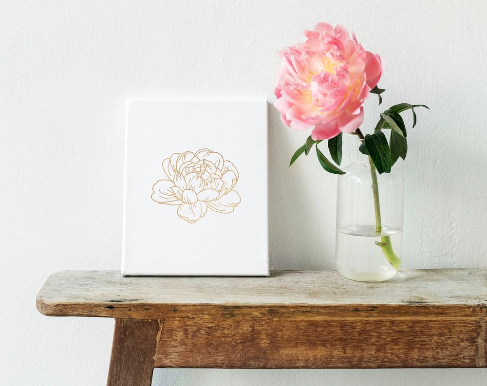 Pink peony in a vase by the wall with a card mockup