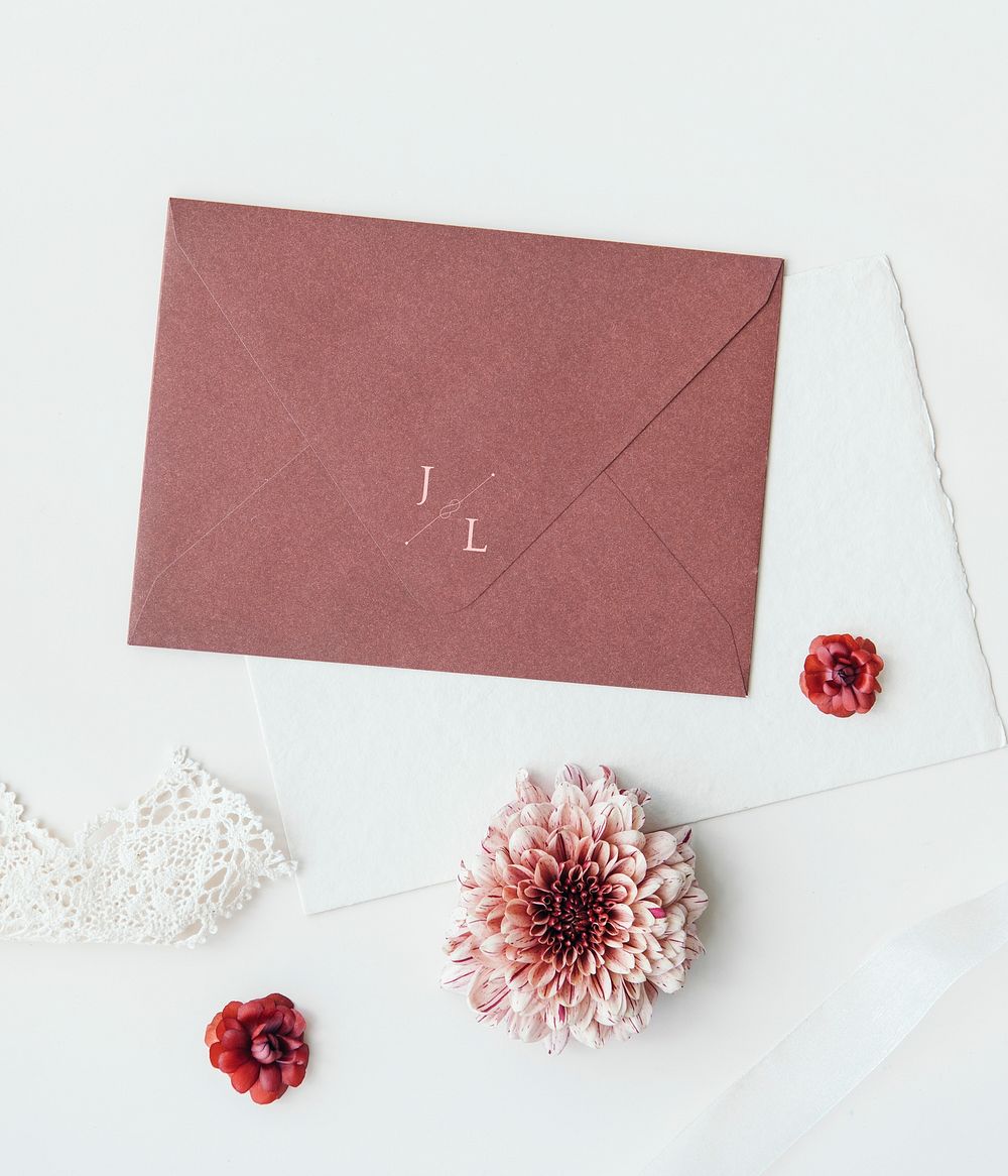 Pale red envelope mockup with flowers