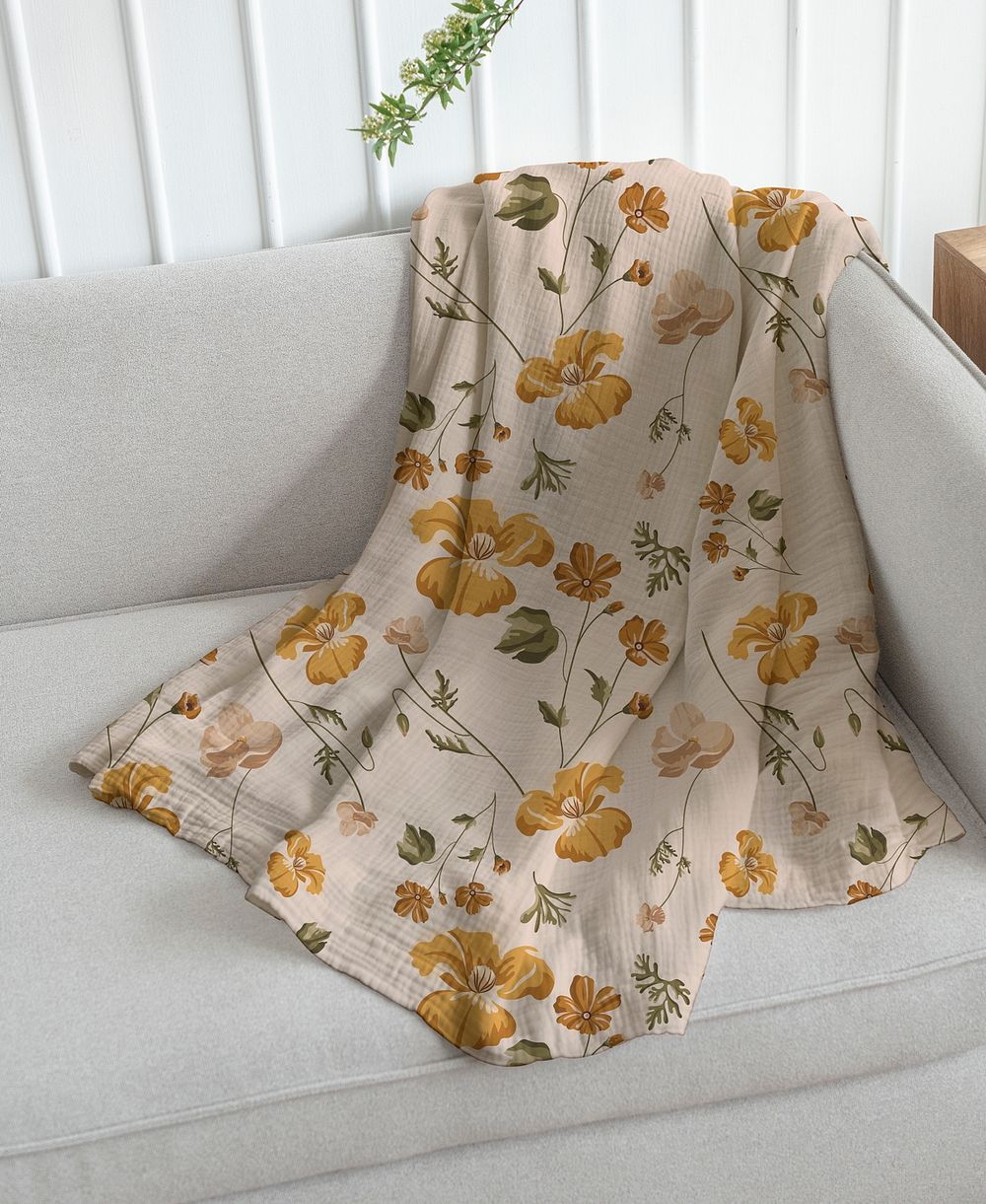Throw blanket mockup psd in floral pattern living concept