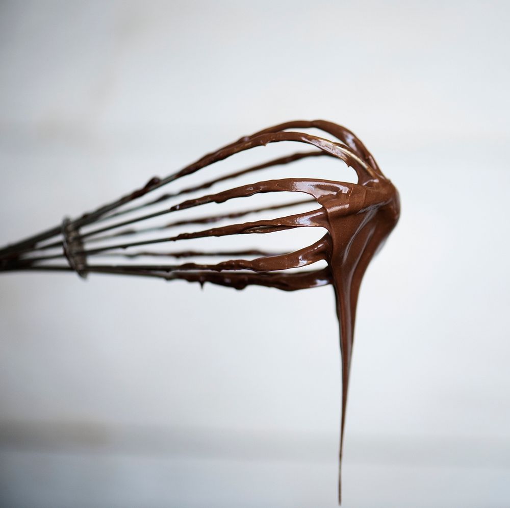 Chocolate sauce on a whisk