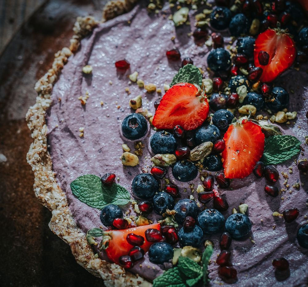 Sweet potato tart topped with strawberries and blueberries