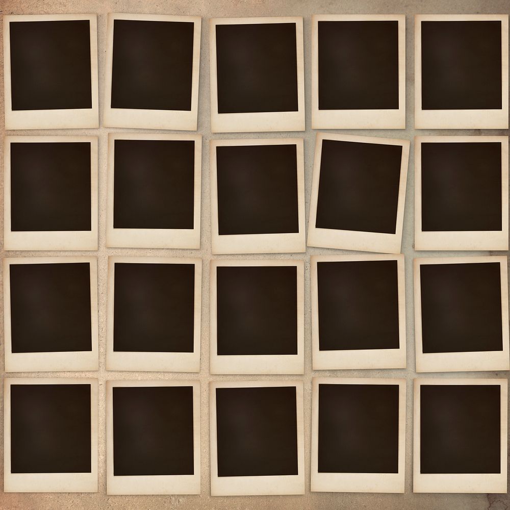 Photo frames in a square on a wall