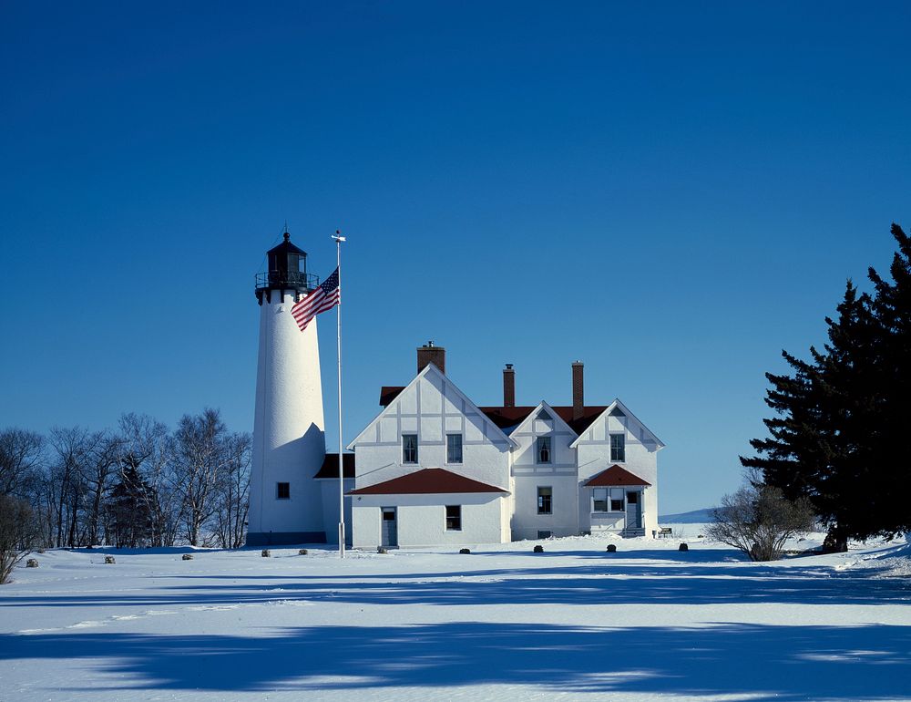Point Iroquois Light Station in upper MIchigan's Hiawatha National Forest stands on the point on Lake Superior where…