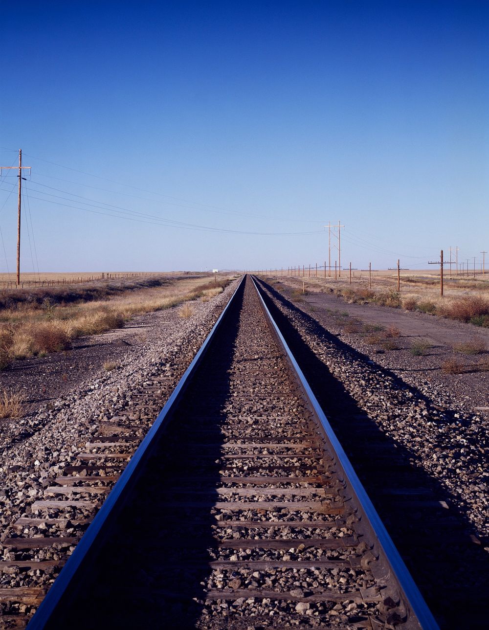Train track to infinity on the eastern Colorado plains. Old Mammoth Road. Original image from Carol M. Highsmith&rsquo;s…