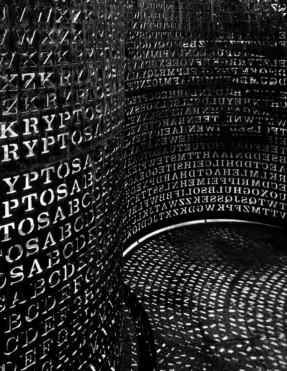 Art made of "code" named Kryptos sits on the grounds of the C.I.A. Headquarters in Virginia. Original image from Carol M.…
