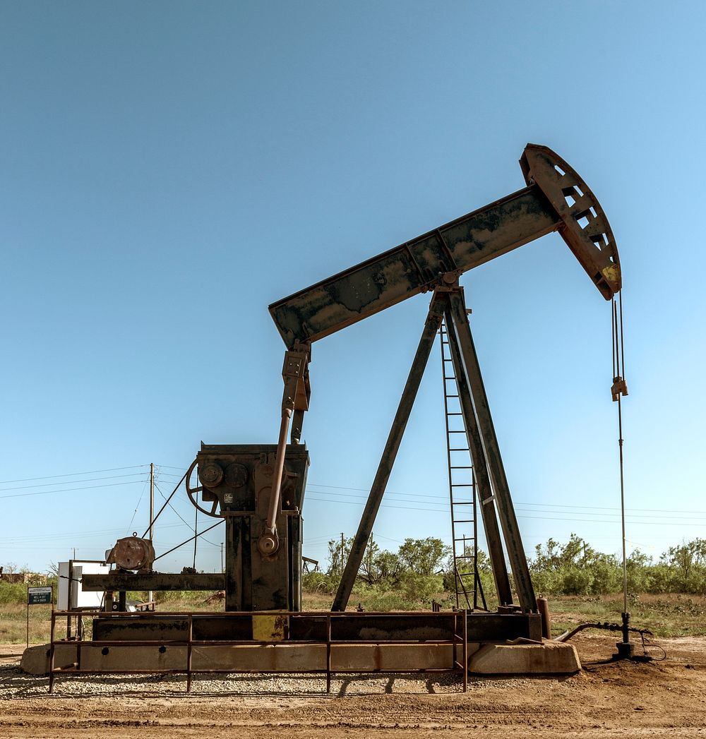 A pumpjack, sometimes called a "grasshopper" oil pump because of its appearance, Texas. Original image from Carol M.…