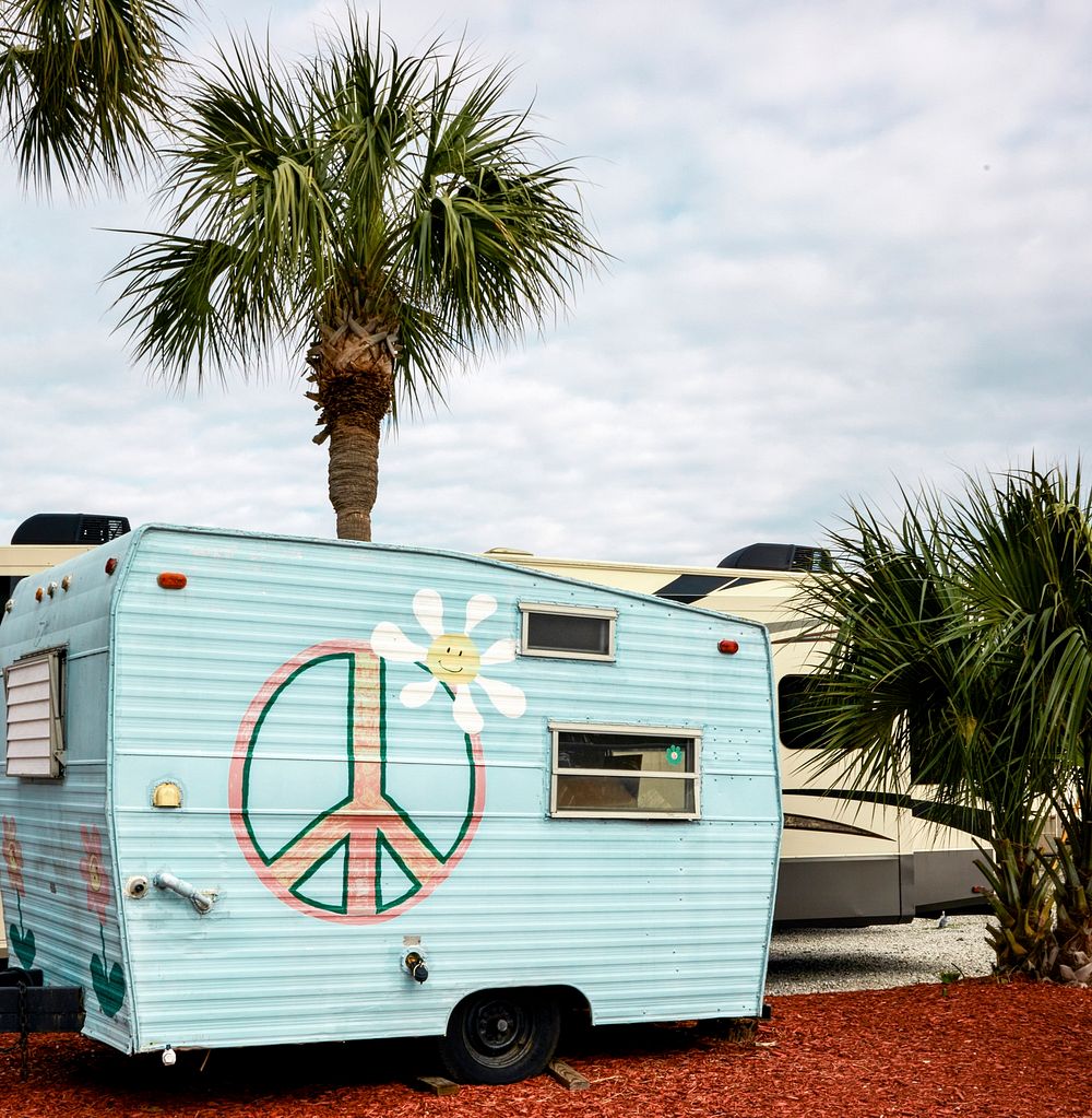 Hippie recreational vehicle at the entrance of the Gander RV Sales in Gulf Breeze, Florida. Original image from Carol M.…