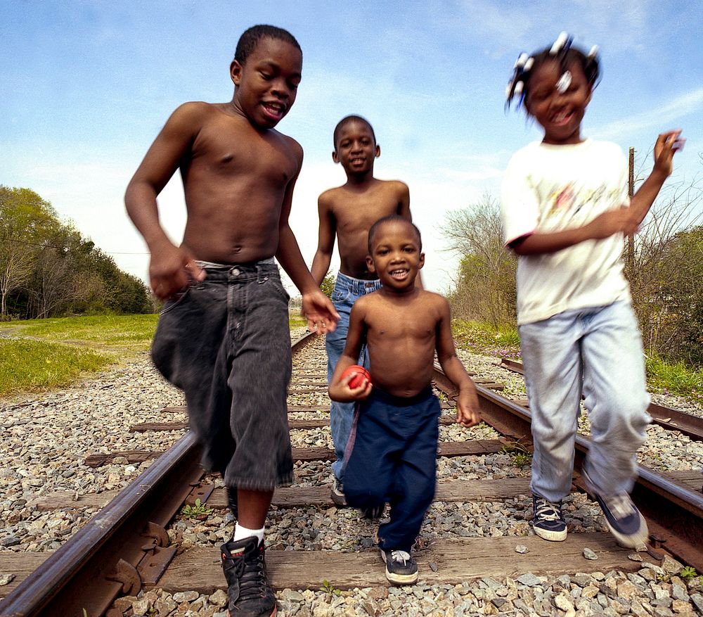 Young children run on the railroad tracks in Savannah, Georgia. Original image from Carol M. Highsmith&rsquo;s America…
