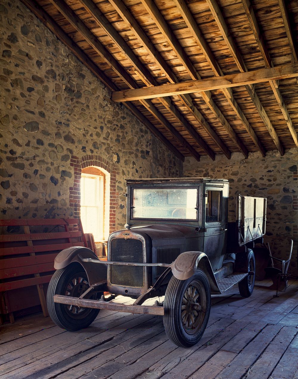 A classic 1925 Chevrolet truck in the Child-Kleffner Ranch's big barn, Montana. Original image from Carol M.…