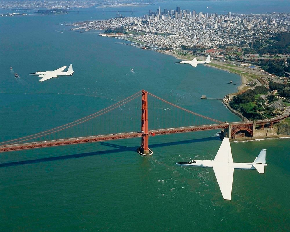 Three ER-2 Aircraft in formation over Golden Gate Bridge, San Francisco, CA on their final flight out of NASA Ames Research…