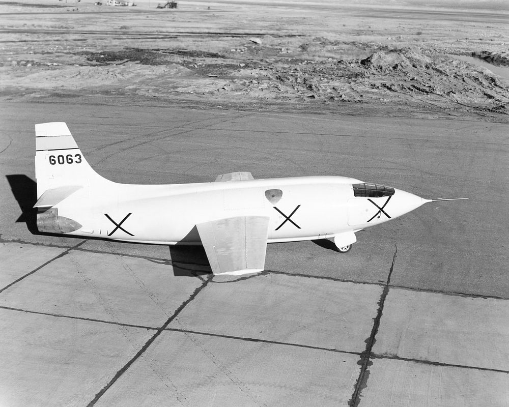 The Bell Aircraft Corporation X-1-2 aircraft on the ramp at NACA High Speed Flight Research Station located on the South…